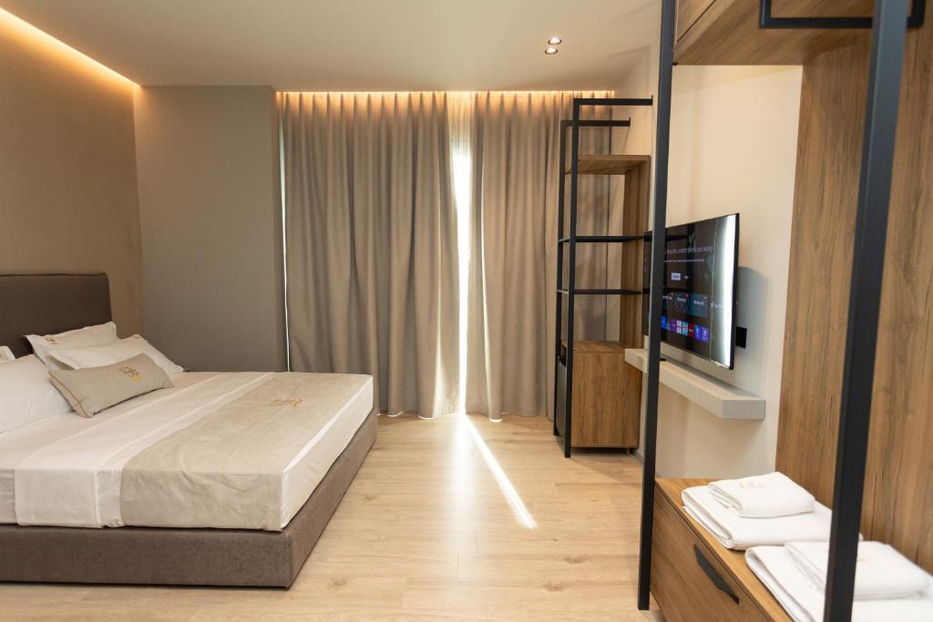 Postel nebo postele na pokoji v ubytování South Inn Hotel