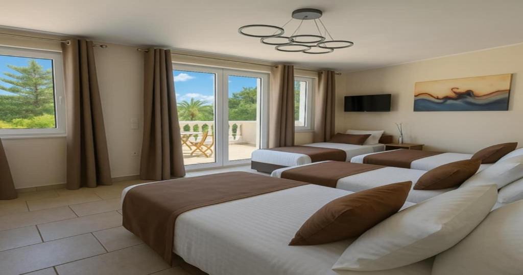 Postel nebo postele na pokoji v ubytování Villa Small Paradise