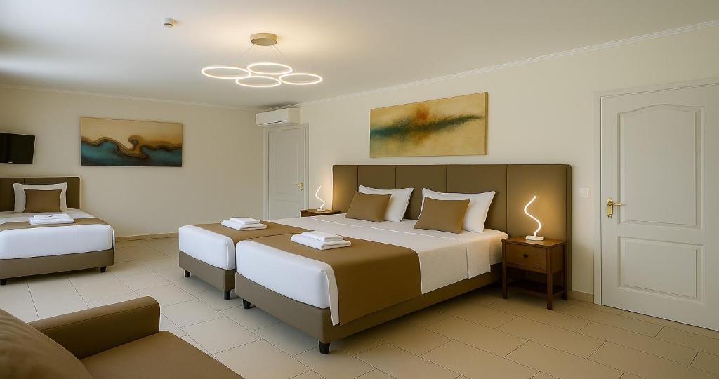 Postel nebo postele na pokoji v ubytování Villa Small Paradise
