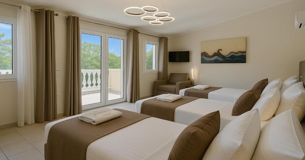 Postel nebo postele na pokoji v ubytování Villa Small Paradise