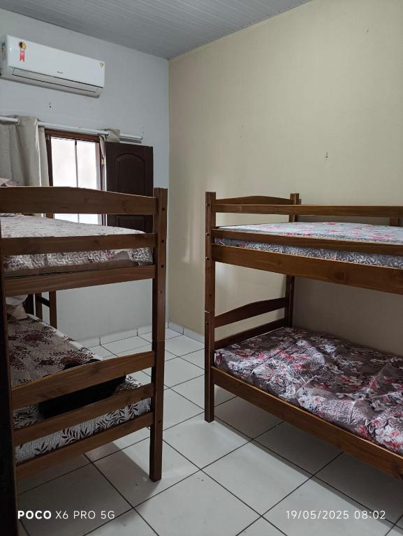 Postel nebo postele na pokoji v ubytování Hostel Refúgio dos Lençóis