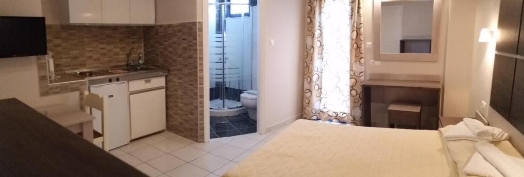 Koupelna v ubytování Pallada Hotel