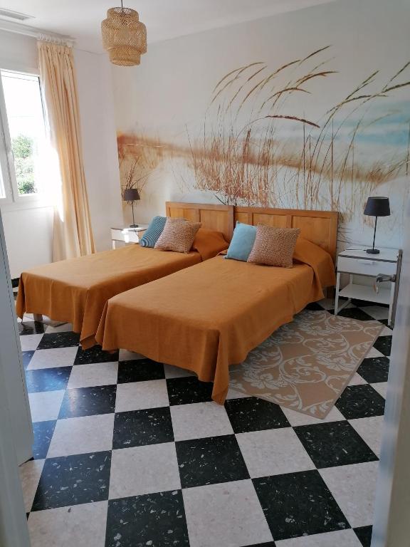 Postel nebo postele na pokoji v ubytování Grande Villa divisée en deux logements