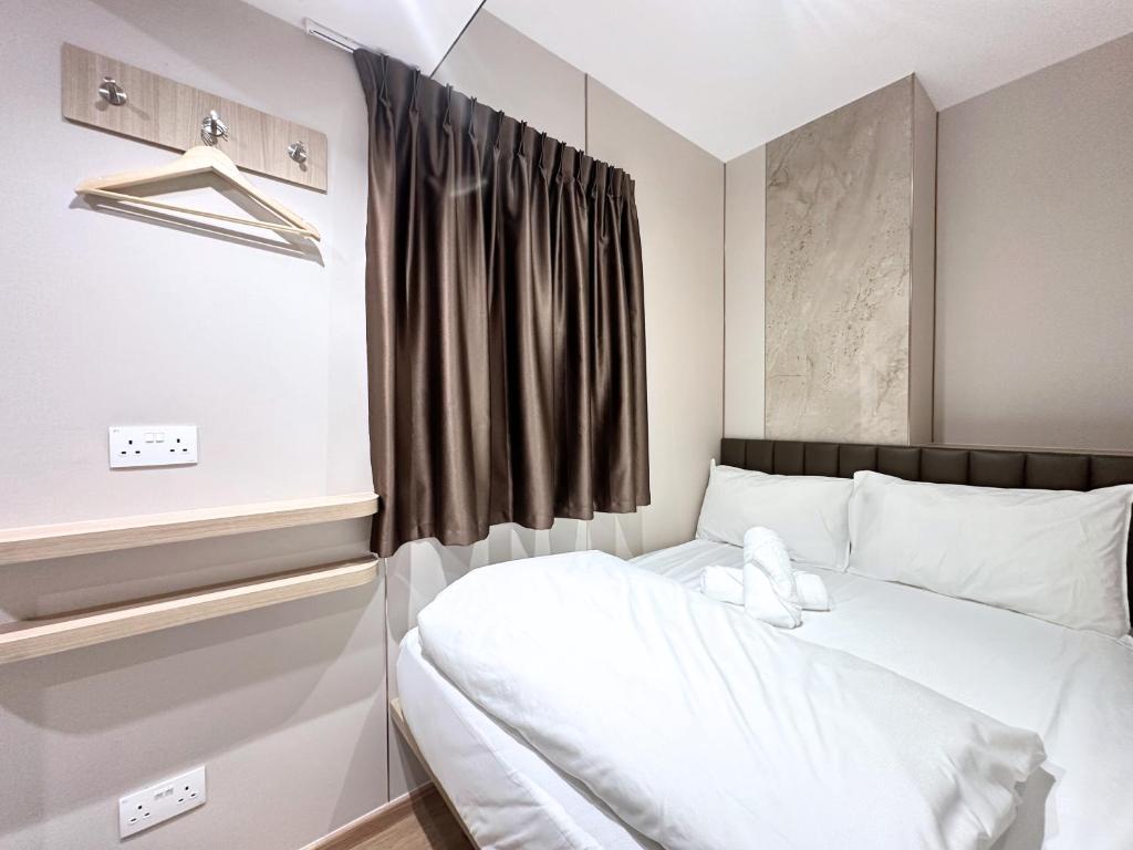 Postel nebo postele na pokoji v ubytování Nest Hotel Singapore