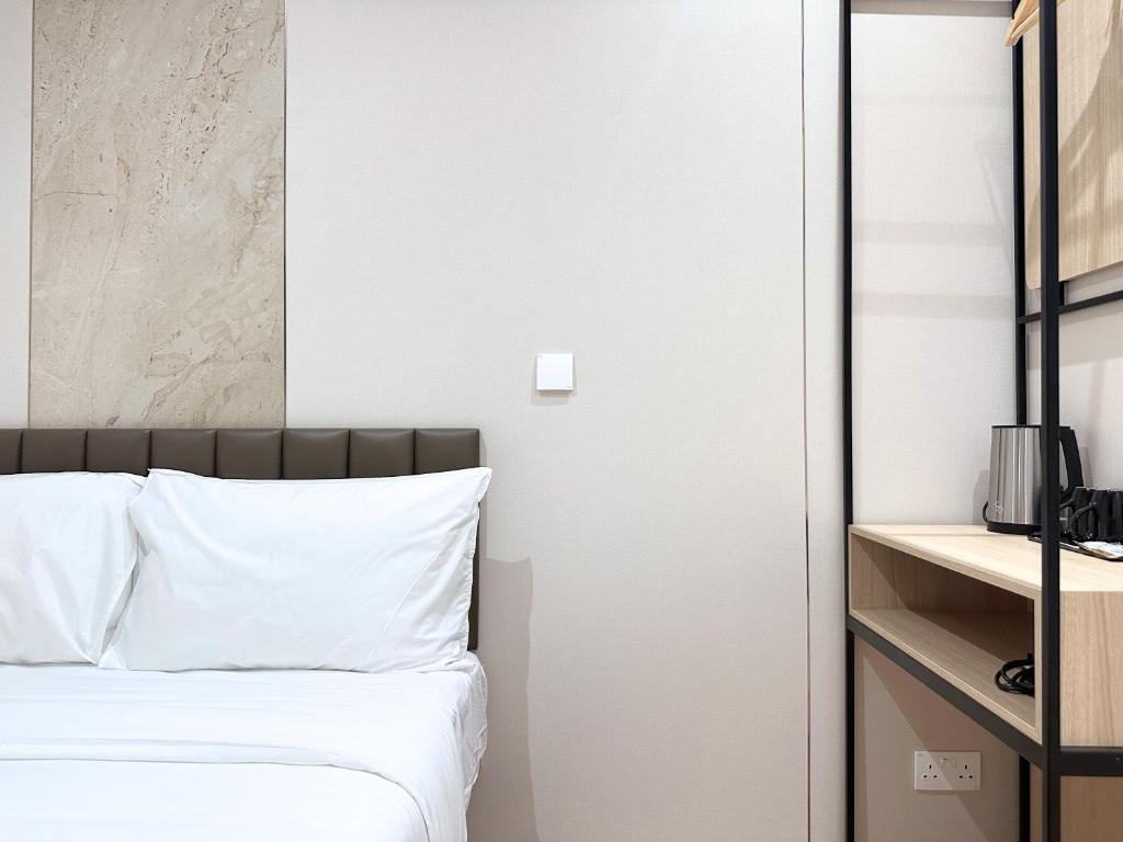 Postel nebo postele na pokoji v ubytování Nest Hotel Singapore