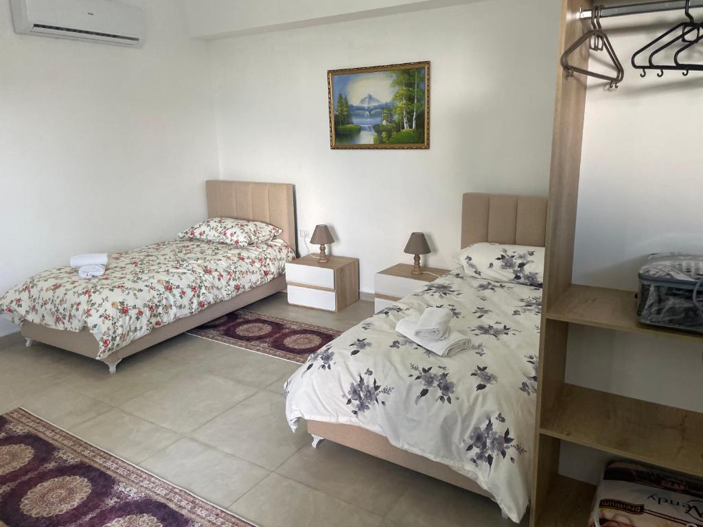 Postel nebo postele na pokoji v ubytování Guest House Banaj
