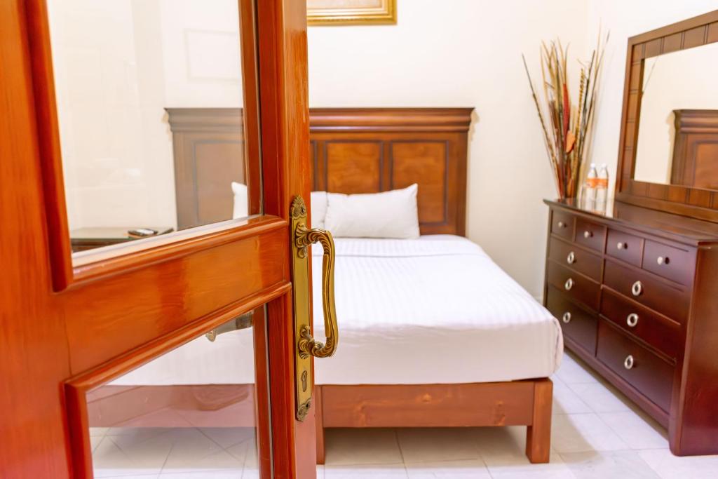 Postel nebo postele na pokoji v ubytování HOTEL CASONA MISIONES