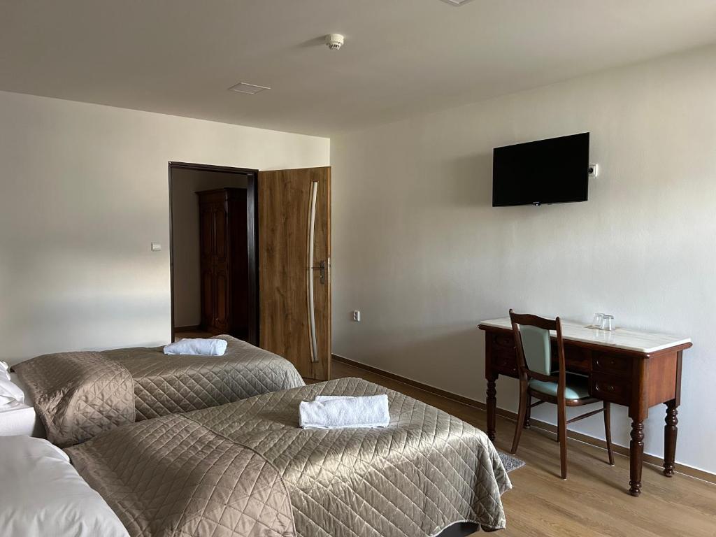 Postel nebo postele na pokoji v ubytování Hotel Zámek Letohrad