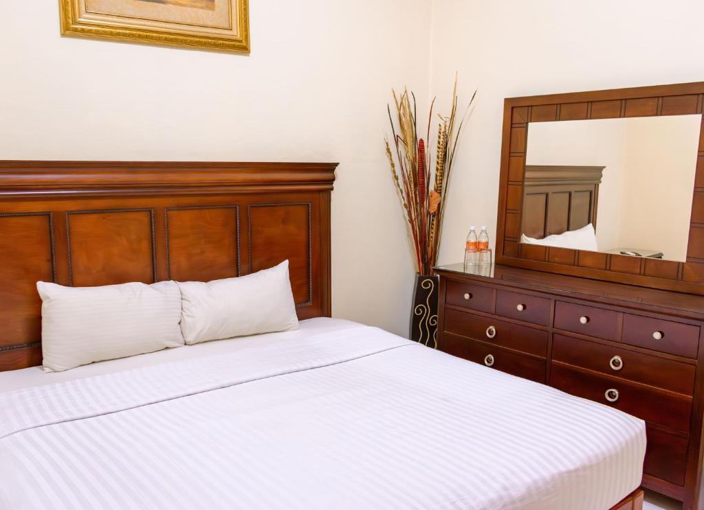 Postel nebo postele na pokoji v ubytování HOTEL CASONA MISIONES