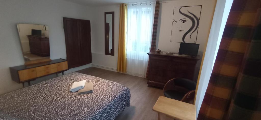 Postel nebo postele na pokoji v ubytování Chez Alex' guesthouse