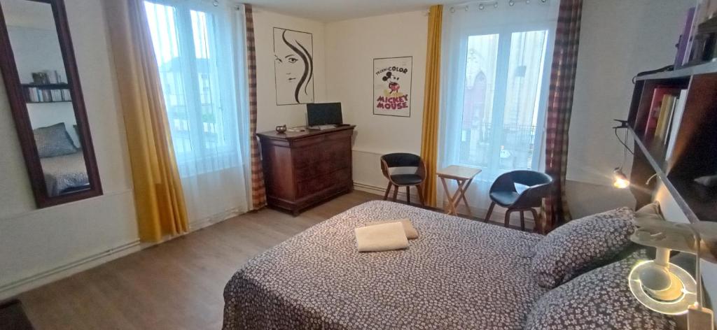 Postel nebo postele na pokoji v ubytování Chez Alex' guesthouse