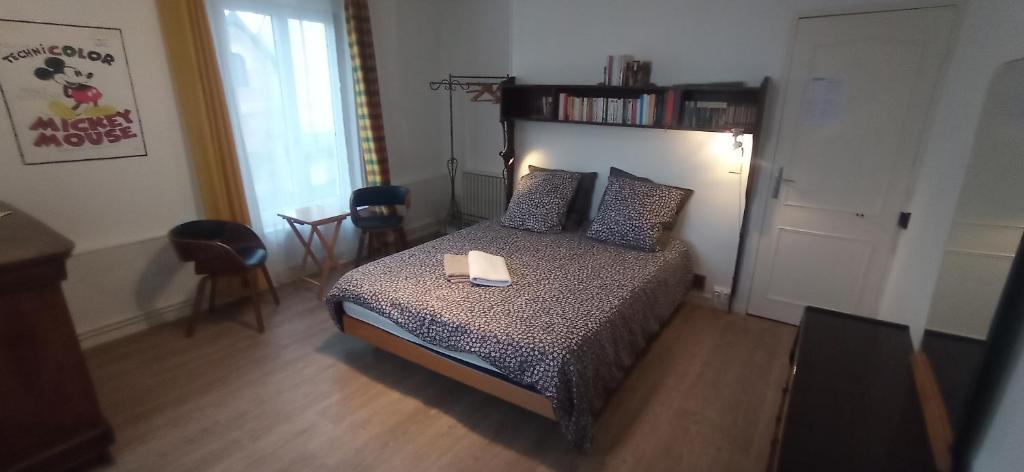 Postel nebo postele na pokoji v ubytování Chez Alex' guesthouse
