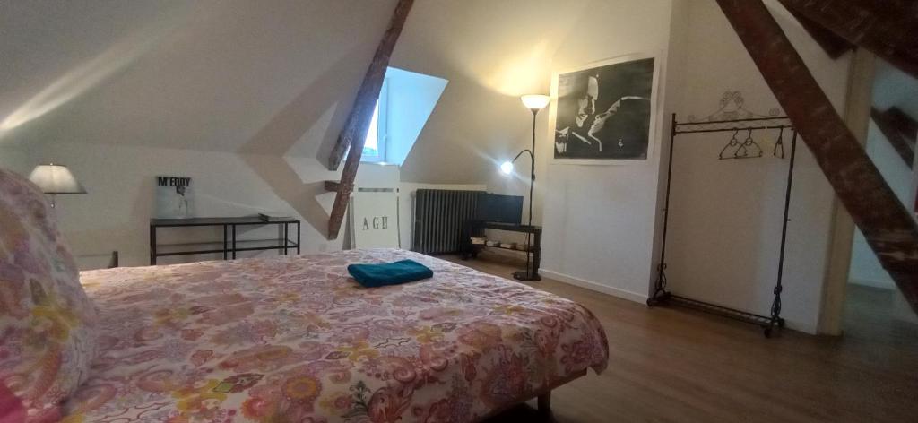 Postel nebo postele na pokoji v ubytování Chez Alex' guesthouse