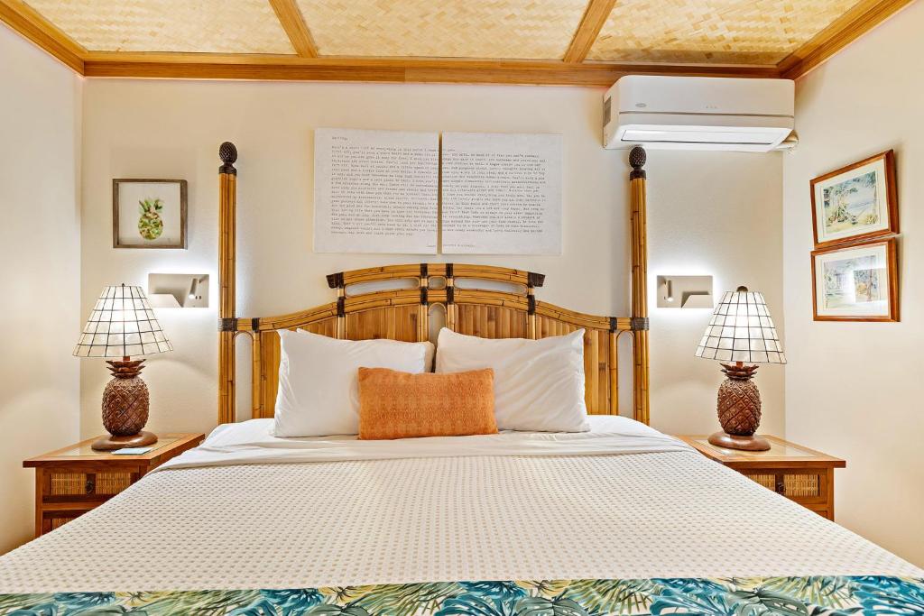 Postel nebo postele na pokoji v ubytování Kihei Kai Oceanfront Condos