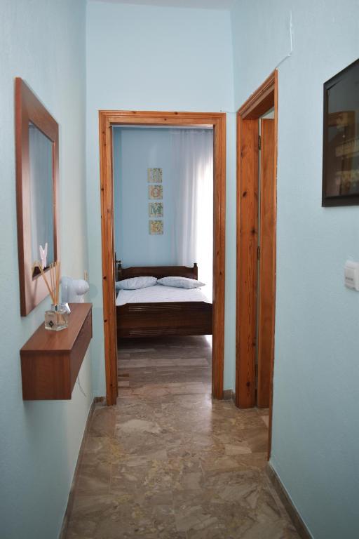 Postel nebo postele na pokoji v ubytování Ainalis Apartments