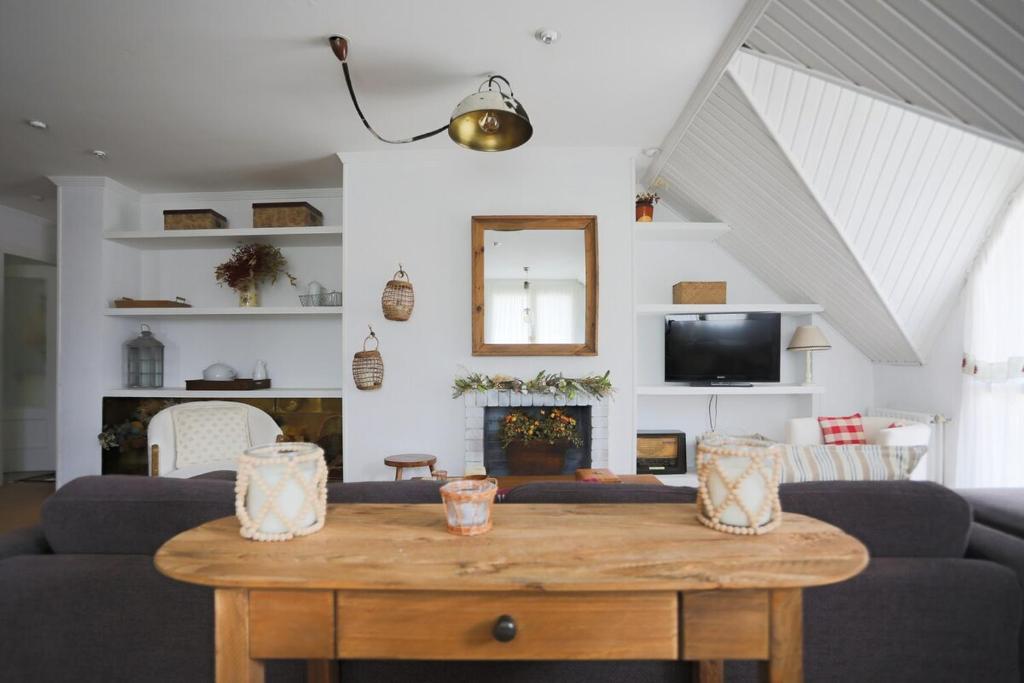 TV a/nebo společenská místnost v ubytování Ilargi, cálido, familiar, garaje y petfriendly - Arafita Apartamentos