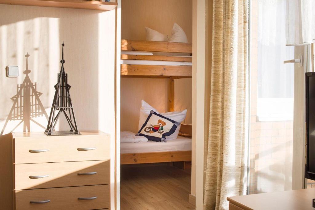 Postel nebo postele na pokoji v ubytování Frauenpreis-Whg-205