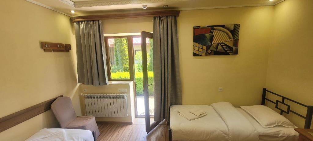 Postel nebo postele na pokoji v ubytování DALLAR Guest House