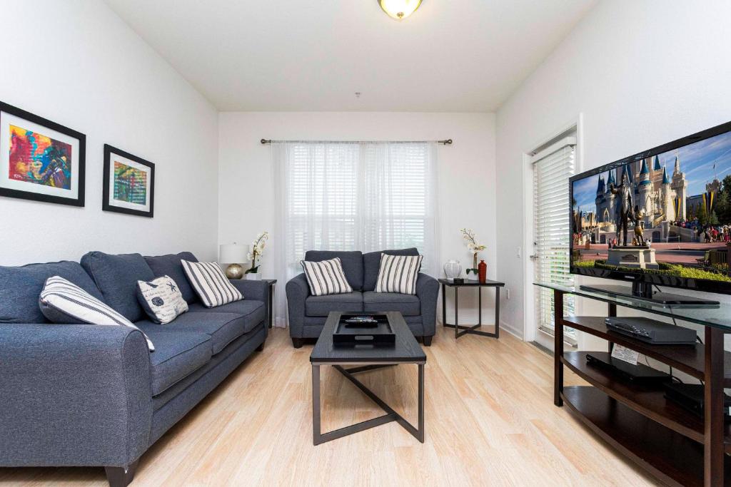 Et tv og/eller underholdning på Gorgeous Apartment in Orlando at Vista Cay Resort VC5000