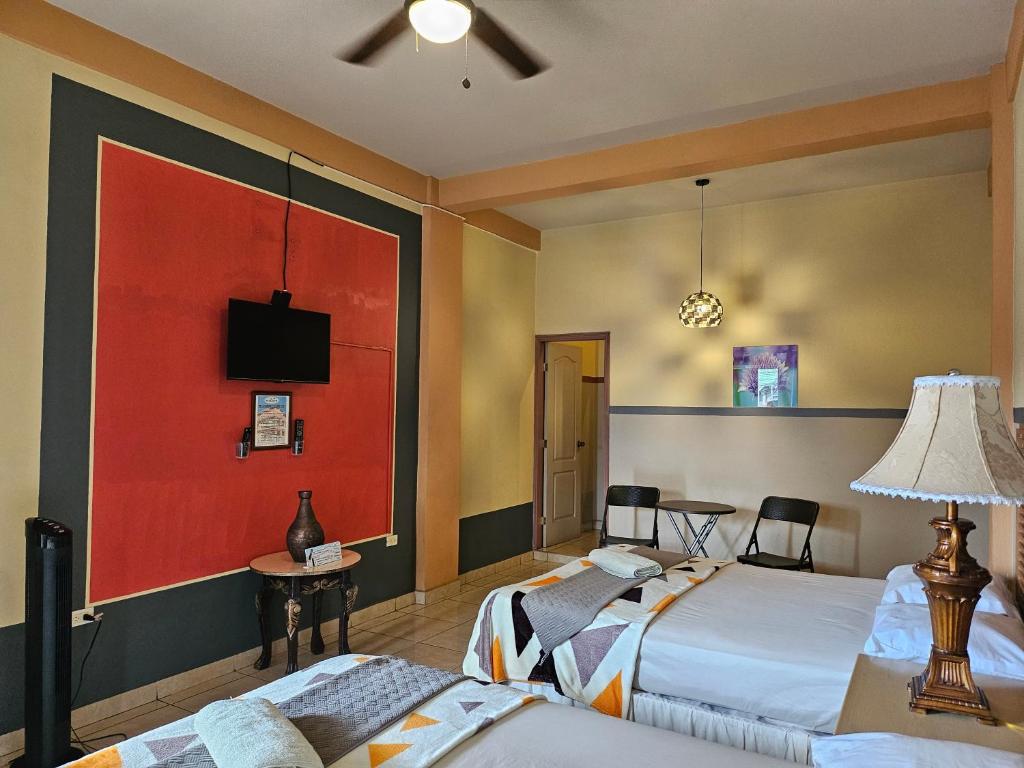 Postel nebo postele na pokoji v ubytování Platinum Hotel