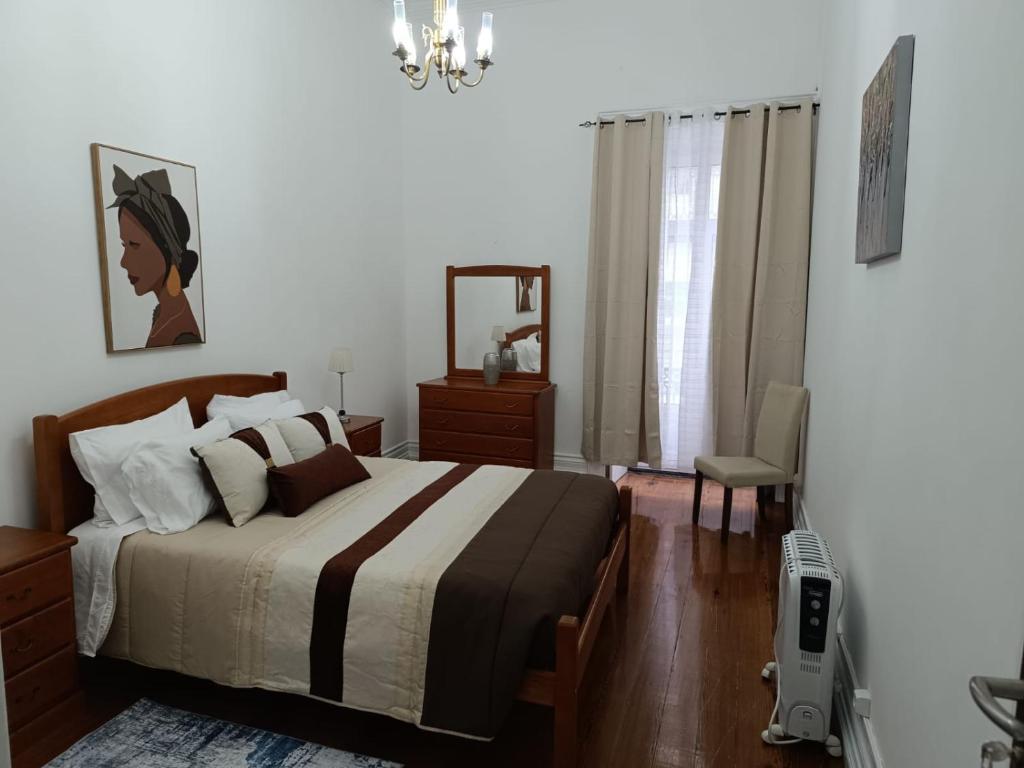 En eller flere senge i et værelse på Casa Branca