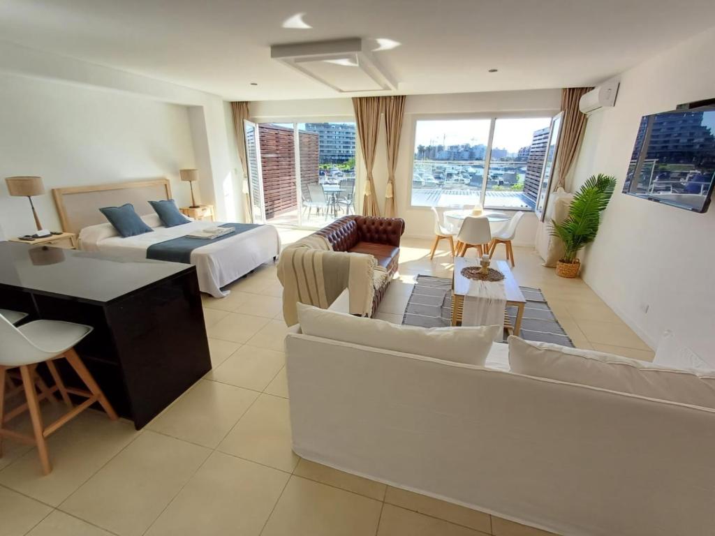 Posezení v ubytování APART , DEPARTAMENTOS loft , bahia grande nordelta , BALCON JACUZZI Y vista a la bahia