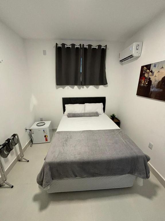 Postel nebo postele na pokoji v ubytování Torre Hotel