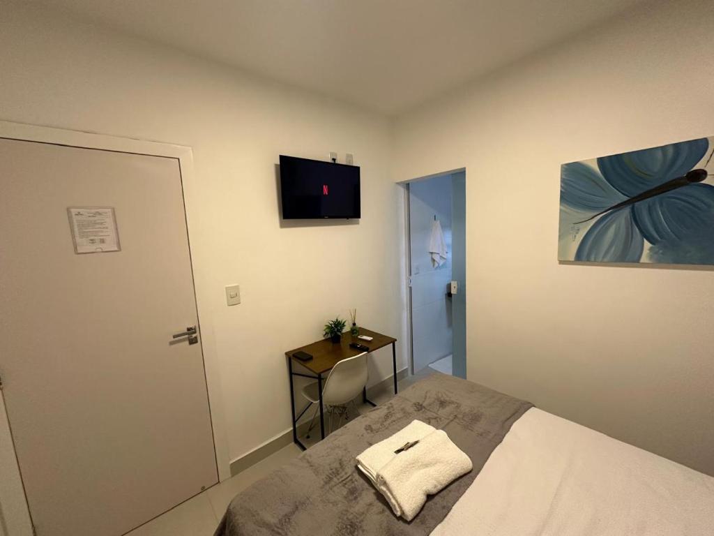Postel nebo postele na pokoji v ubytování Torre Hotel