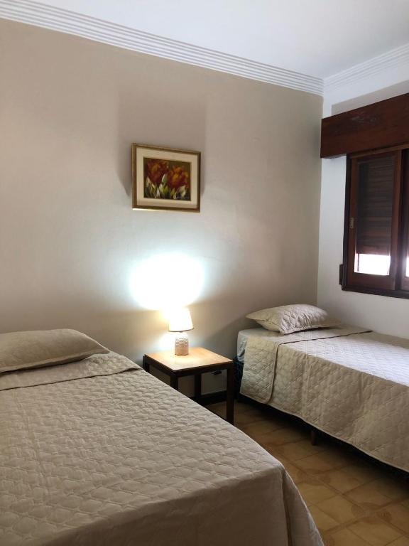 Postel nebo postele na pokoji v ubytování Frida Hostel