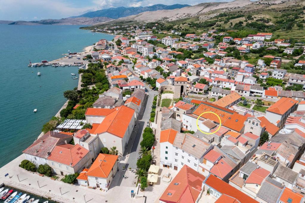 an aerial view of a town by the water at Seaside holiday house Pag - 22602 in Pag