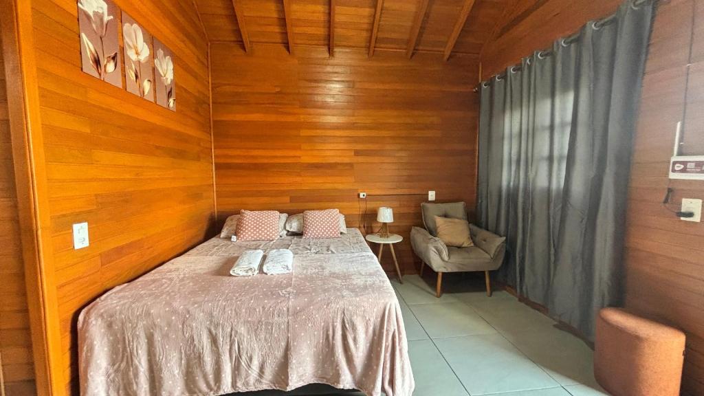 Postel nebo postele na pokoji v ubytování Chalé do Vale