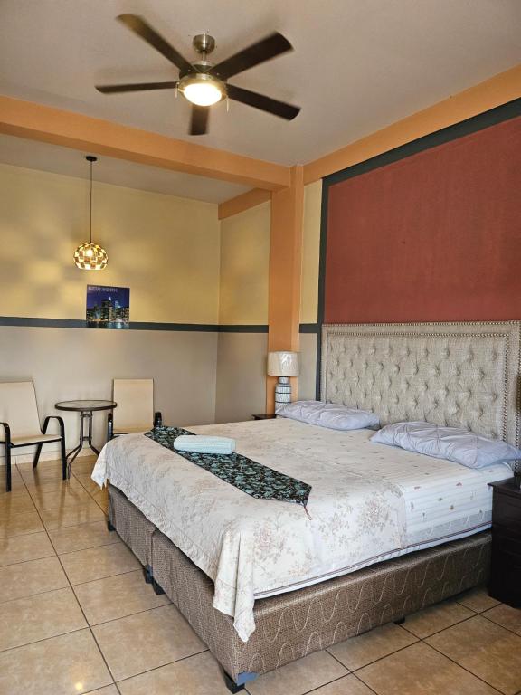 Postel nebo postele na pokoji v ubytování Platinum Hotel