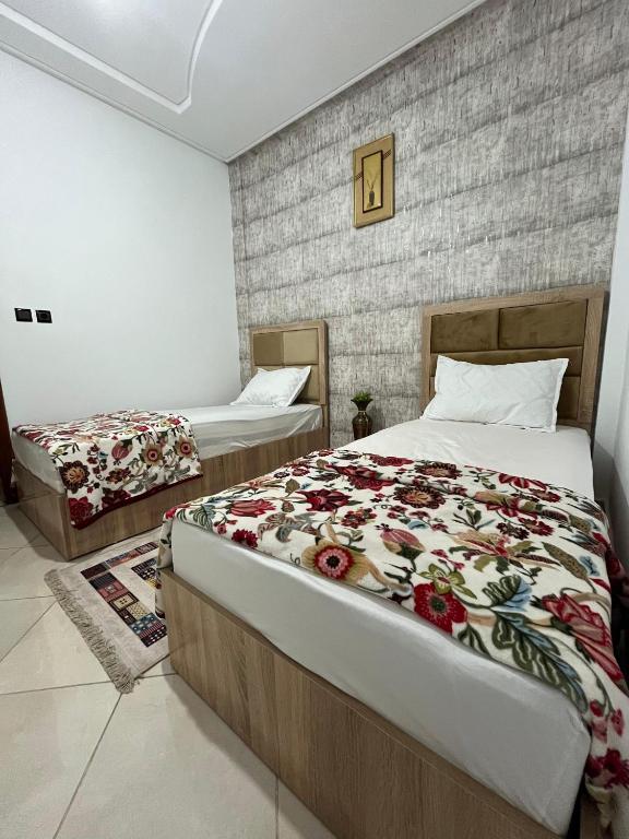 Postel nebo postele na pokoji v ubytování Perfect Cozy Apartment in City Center Hamrya