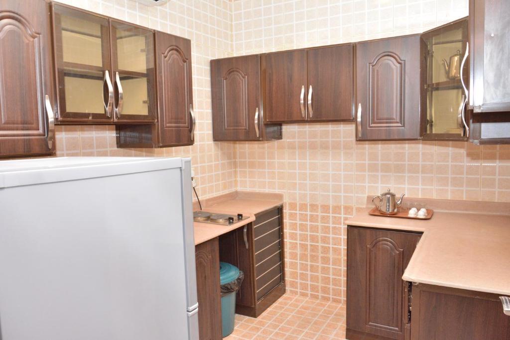 Kjøkken eller kjøkkenkrok på Judy Palace Hotel Suites