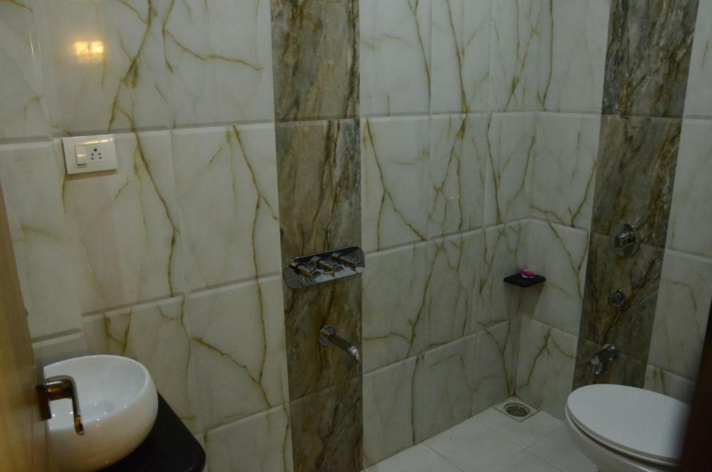 Koupelna v ubytování Hotel Sach Regency