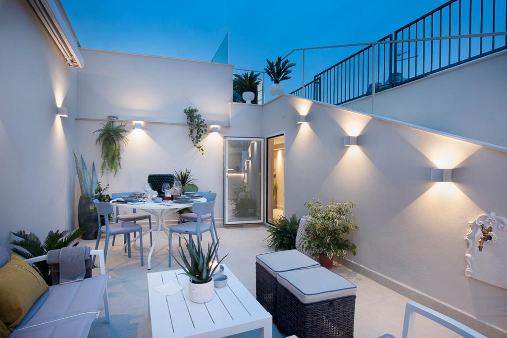 Posedenie v ubytovaní Boutique Terrazza Aurea