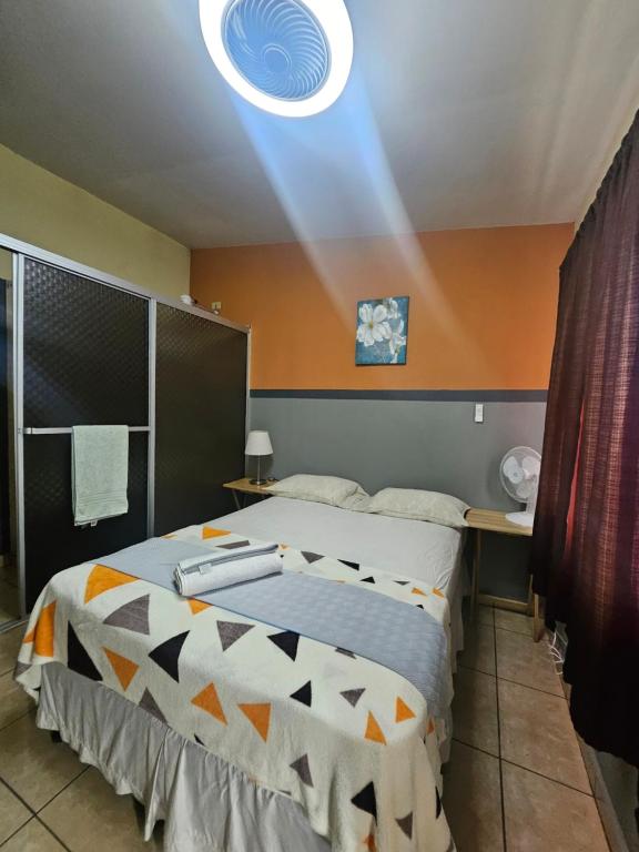 Postel nebo postele na pokoji v ubytování Platinum Hotel