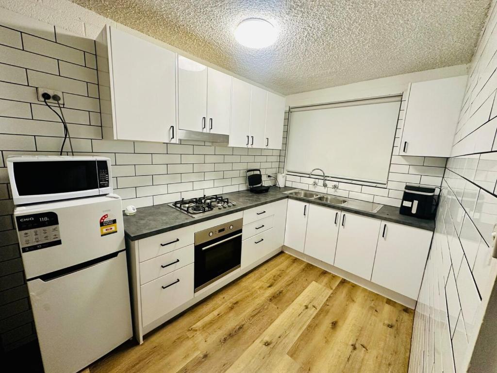 Kuchyň nebo kuchyňský kout v ubytování Second Home