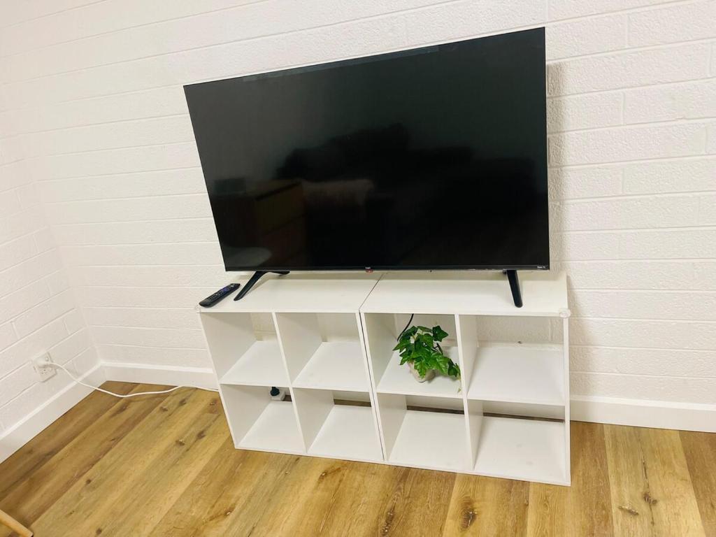 TV a/nebo společenská místnost v ubytování Second Home