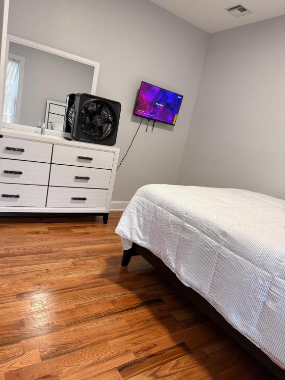Postel nebo postele na pokoji v ubytování Excel homes