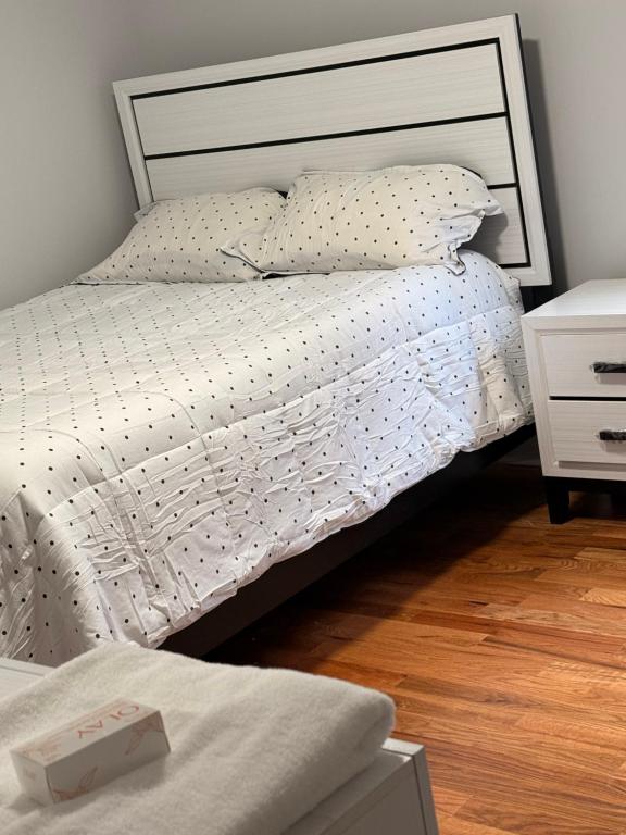 Postel nebo postele na pokoji v ubytování Excel homes