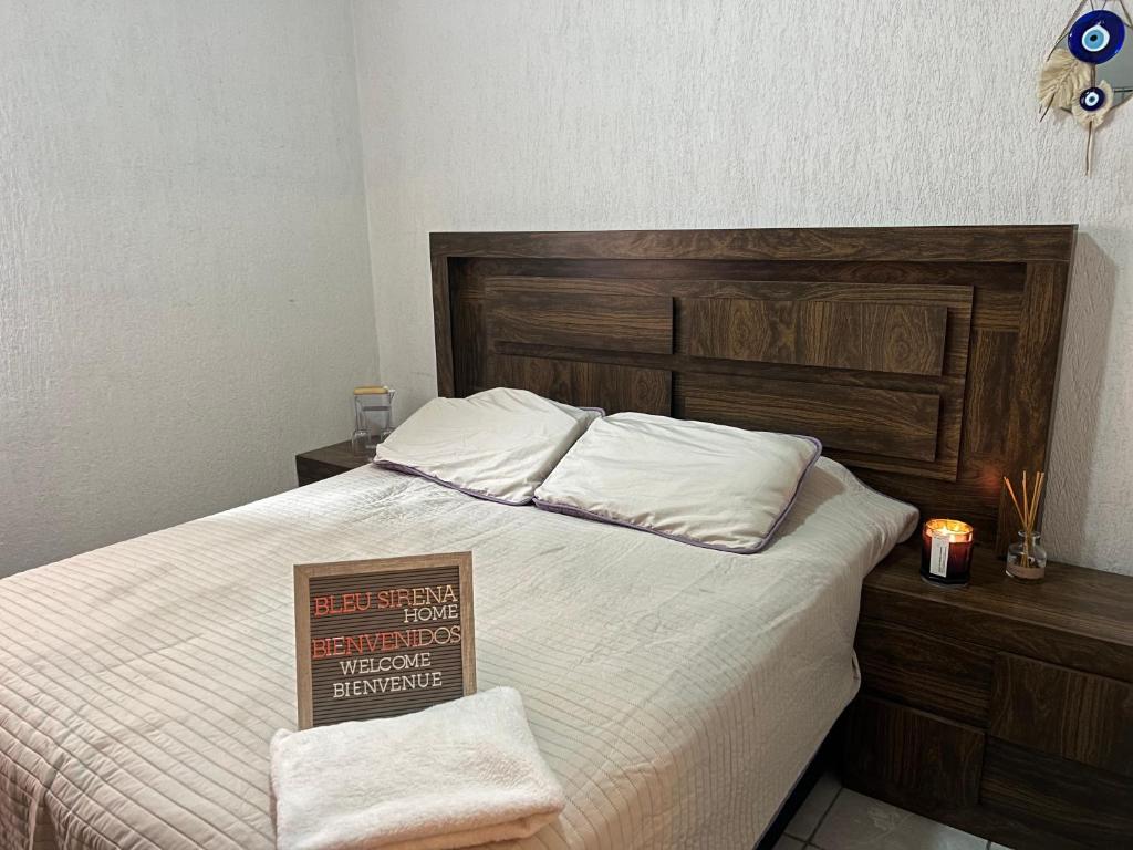 Postel nebo postele na pokoji v ubytování Bleu Sirena