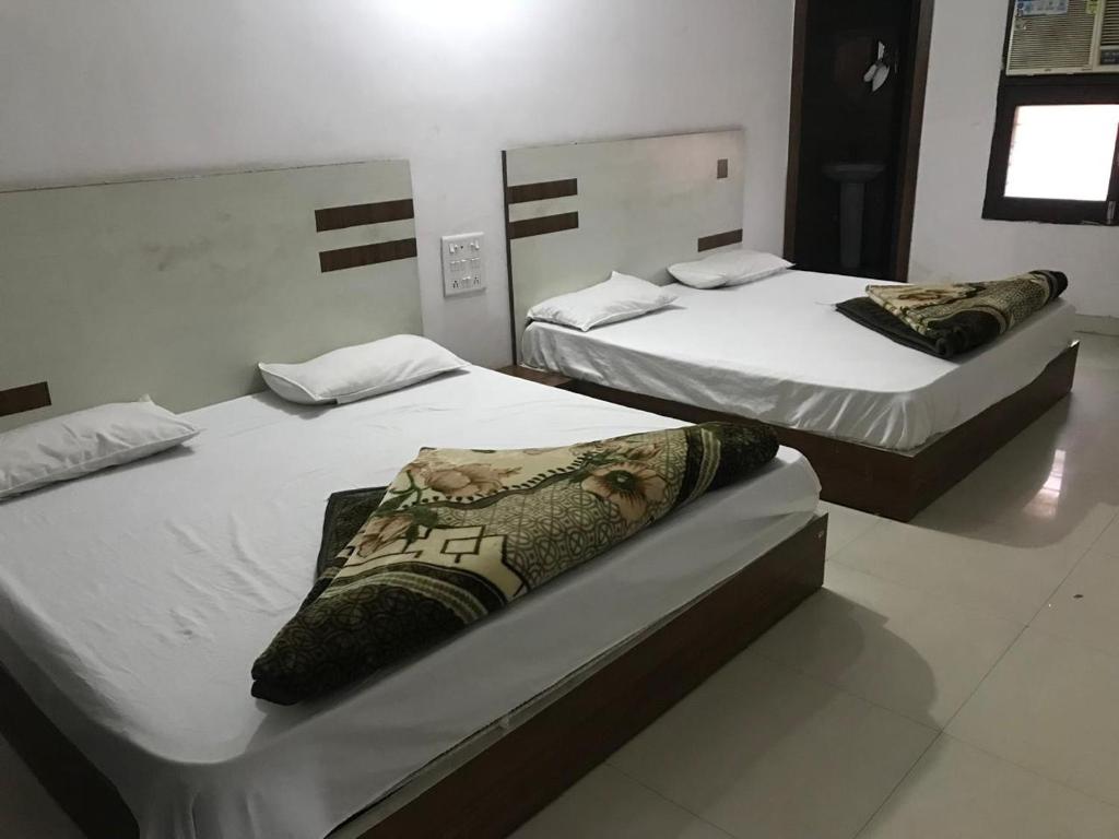 Postel nebo postele na pokoji v ubytování Hotel H5