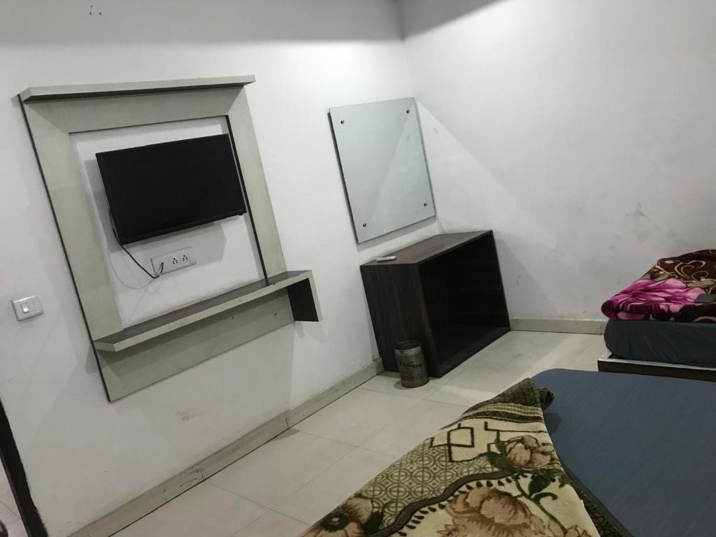 TV a/nebo společenská místnost v ubytování Hotel H5