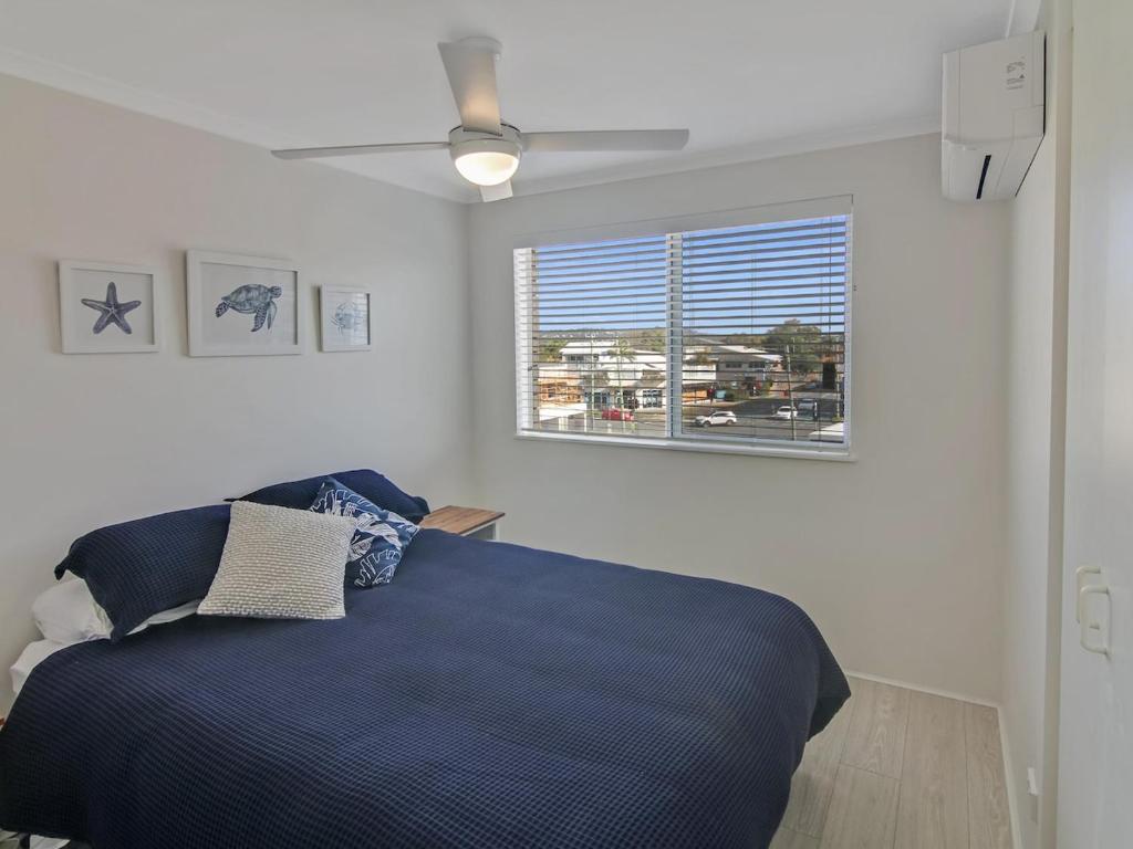 Postel nebo postele na pokoji v ubytování MAINSAIL8- MOOLOOLABA BEACH