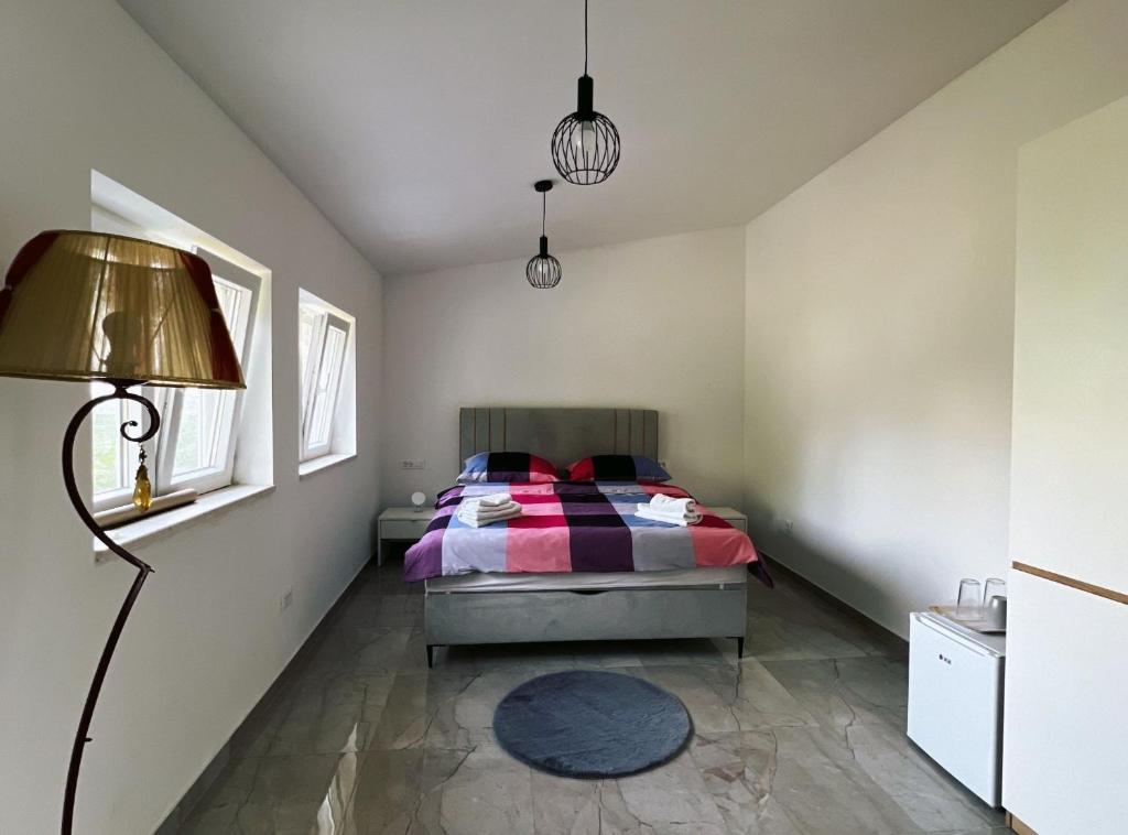 Posteľ alebo postele v izbe v ubytovaní Apartments & Rooms Tapera