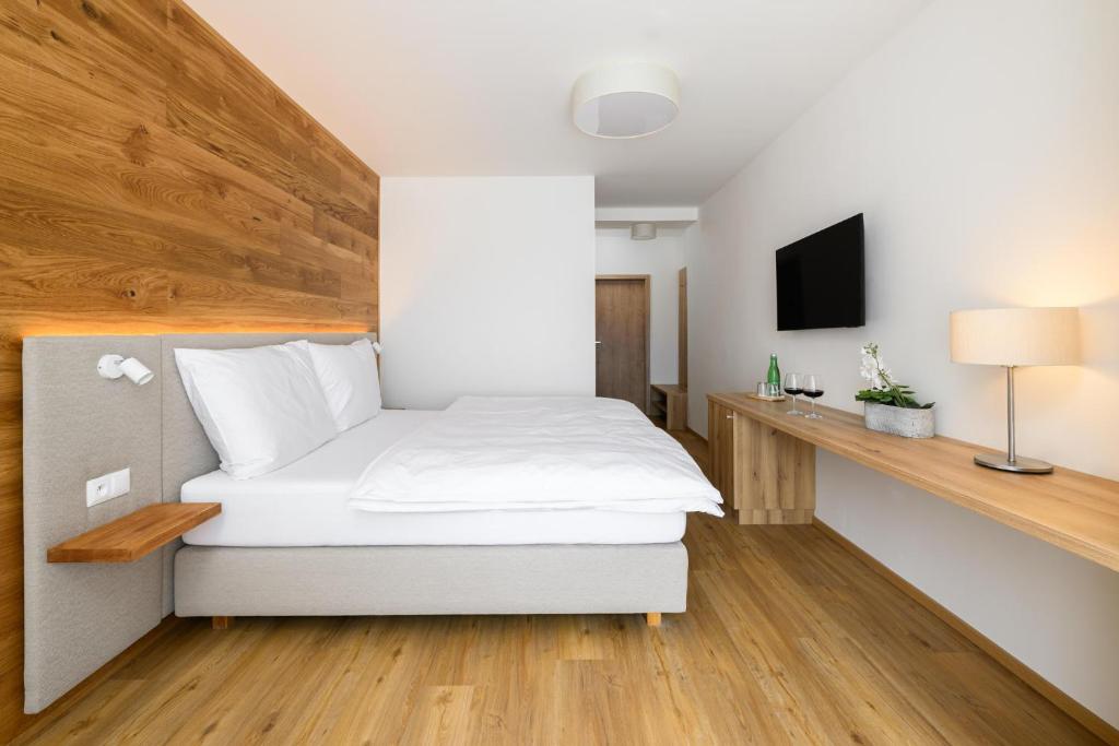 Postel nebo postele na pokoji v ubytování Hotel Schreiner