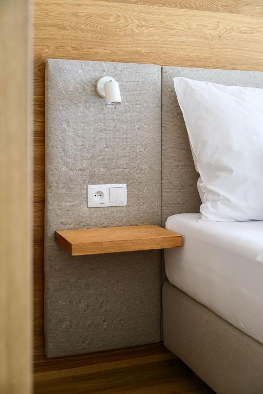 Postel nebo postele na pokoji v ubytování Hotel Schreiner