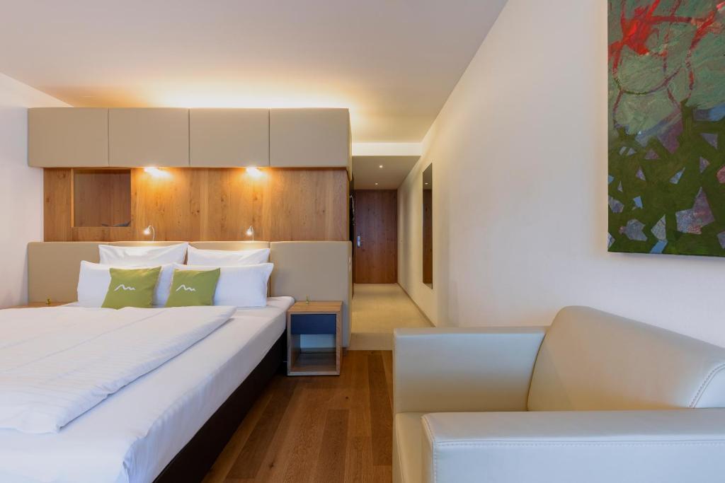Postel nebo postele na pokoji v ubytování m3Hotel