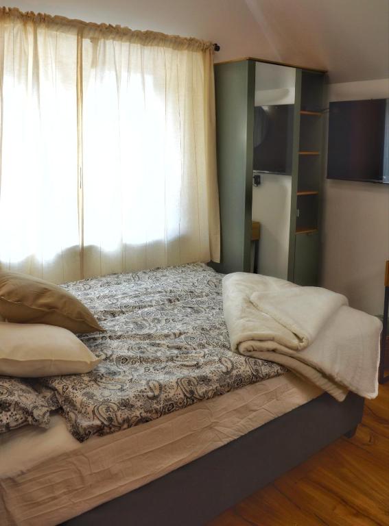 Postel nebo postele na pokoji v ubytování Hiša Plesnik